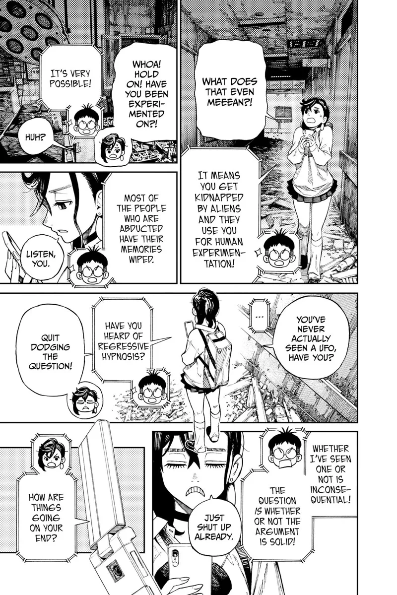 Momo walks in a broken corridor alone during the night looking for aliens. He keeps in touch with the kid using her phone.