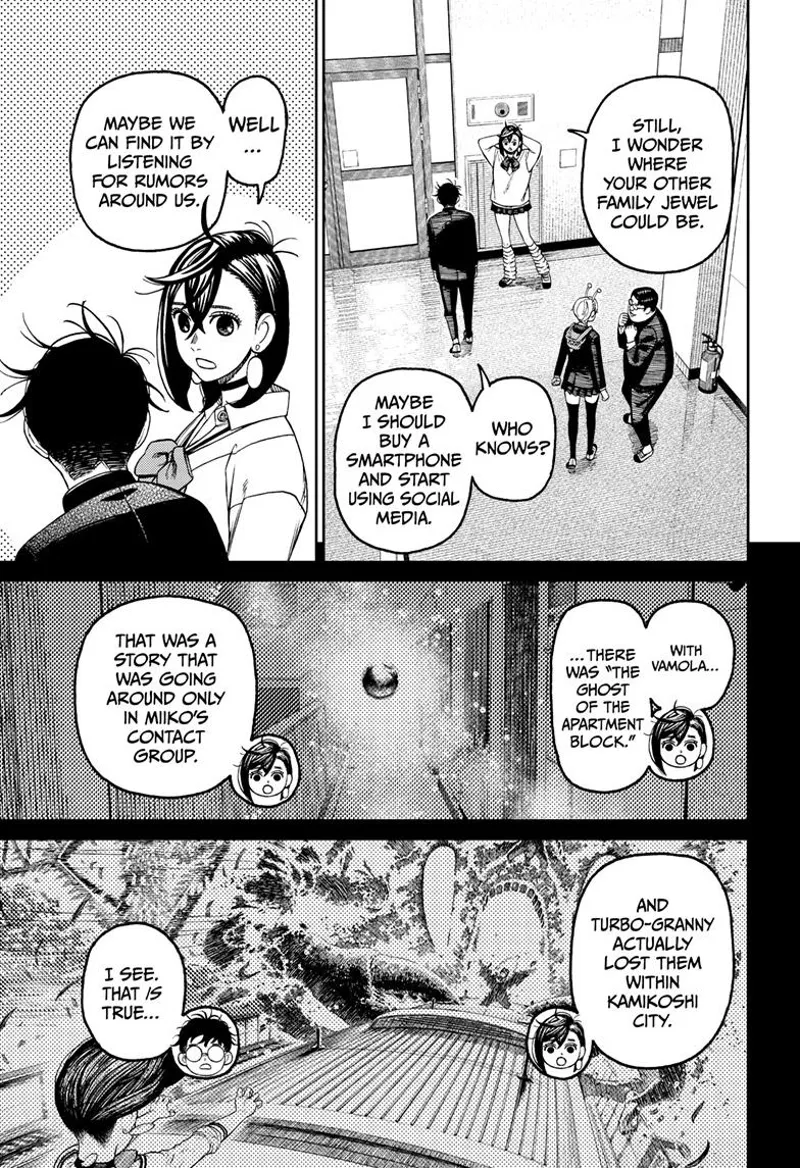 Momo, Vamola, Okarun, and Kinta talk in the school corridor about finding Okarun's second testicle.