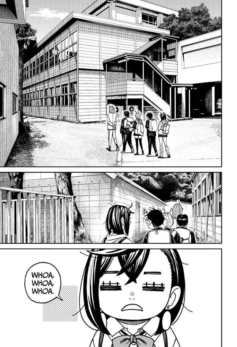 Mr. Sanjome leads Kinta, Vamola, Okarun, and Momo to their clubroom. Momo looks suspiciously at Mr. Sanjome.