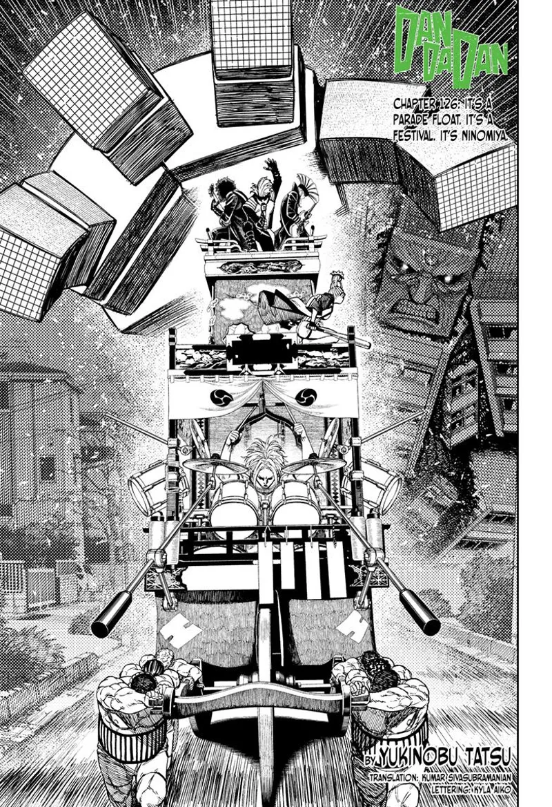 The huge monster extends its arm to catch the Hayashi Performers riding on a float with 4 strong men pulling.