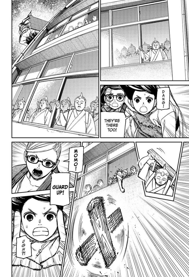 Momo sees humans inside the building throwing wood at them.