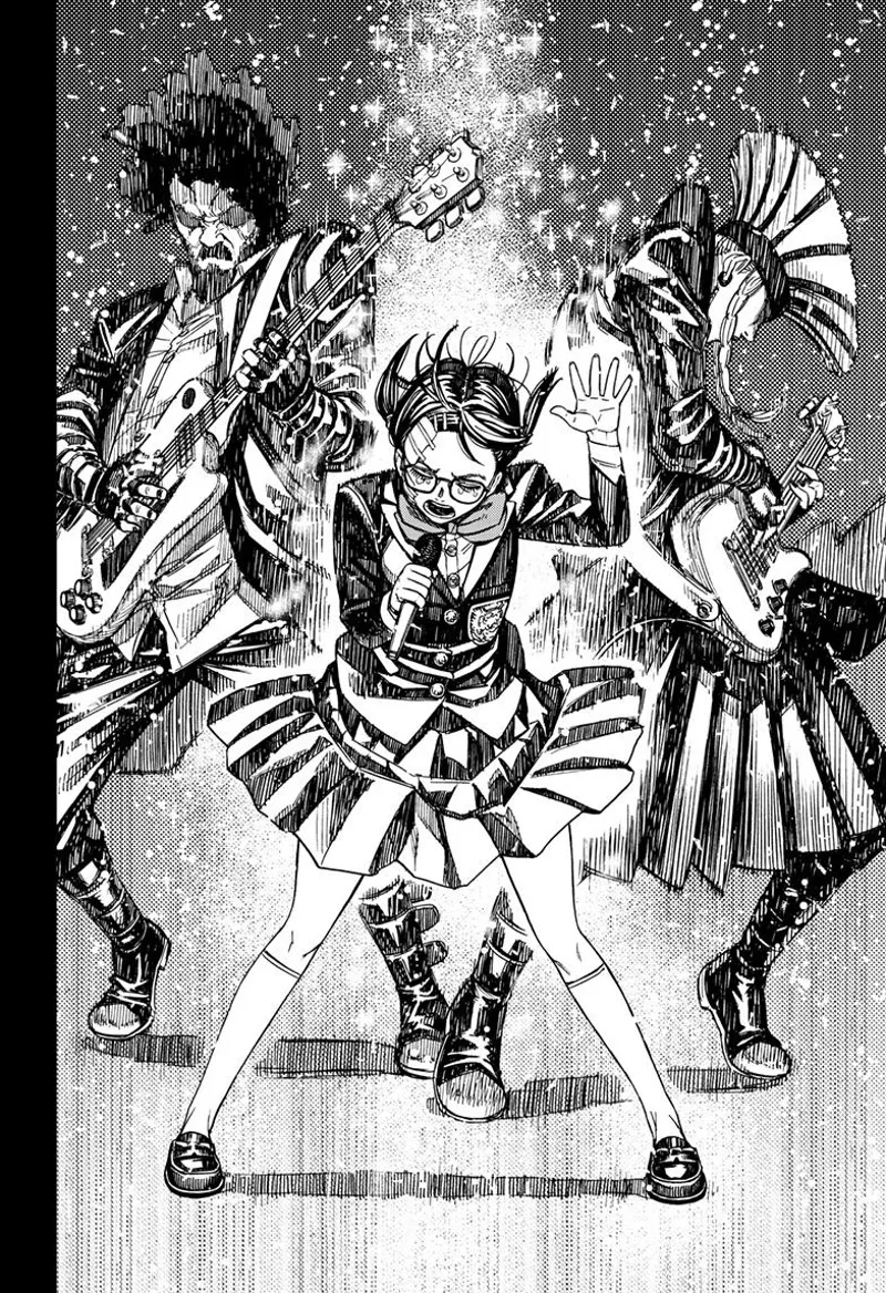 Rin sings, and the guitarist and bassist are behind her. She is covered in glittering light.