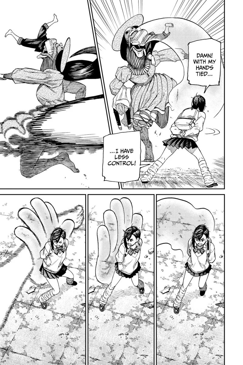 The eerie woman kicks Momo while swallowing Okarun. Momo blocks with her psychic hand.
