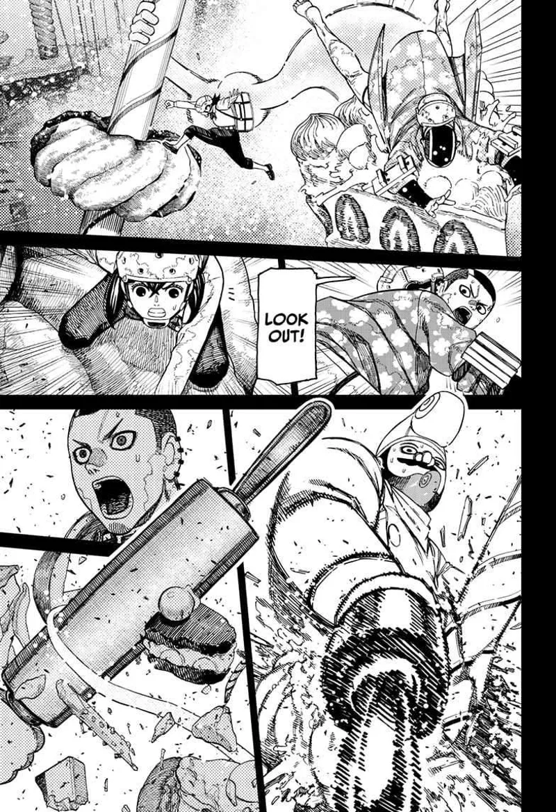 Momo puts Zuma atop a cake as she grabs a giant candy cane. The giant chef smashes them again with his kitchen roll.
