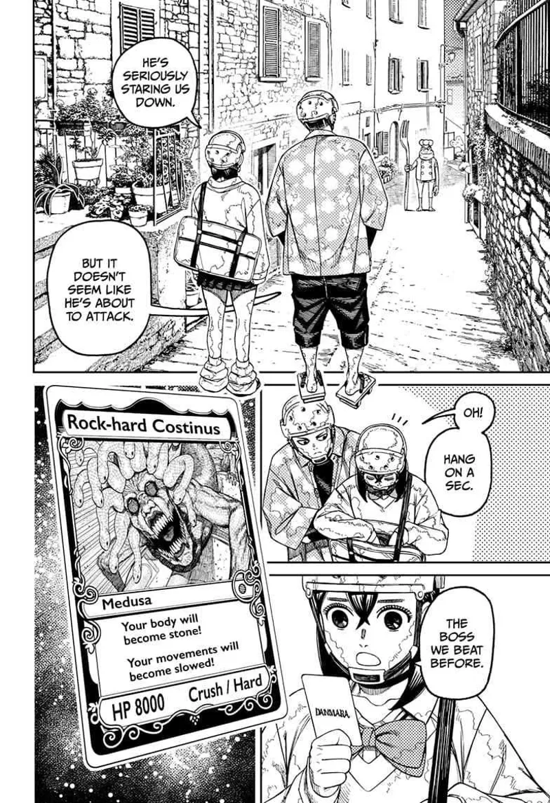 Momo and Zuma stand in an alley, staring at a frog staring at them further ahead. Momo gets the snake monster card.