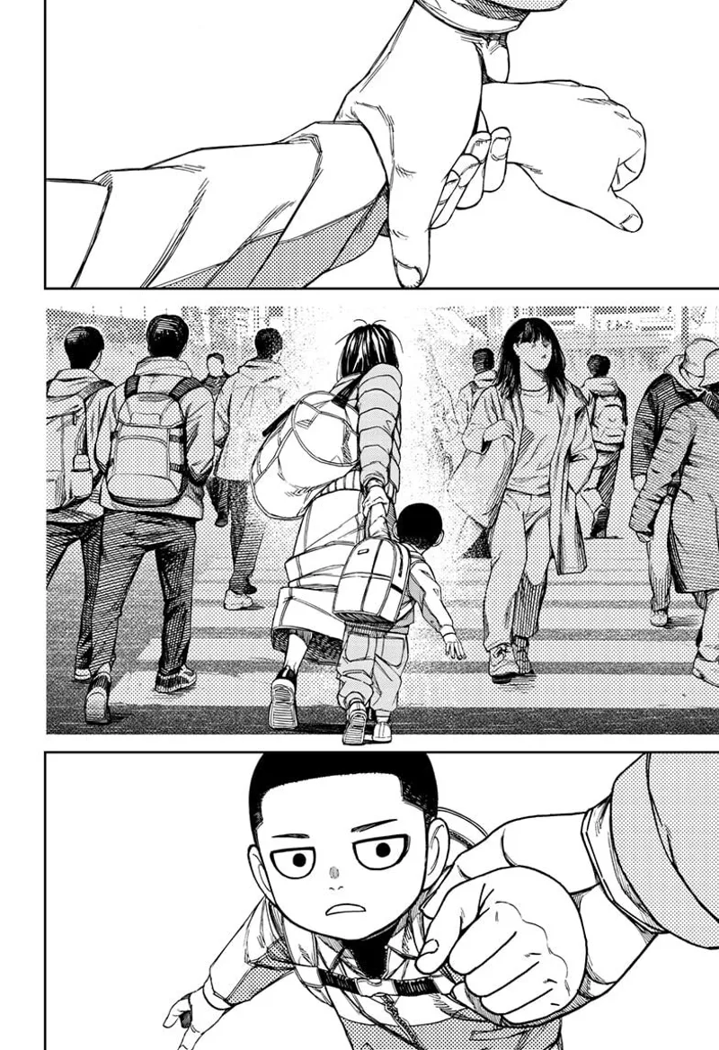 Unji's mom grabs his hand as they enter the busy city.