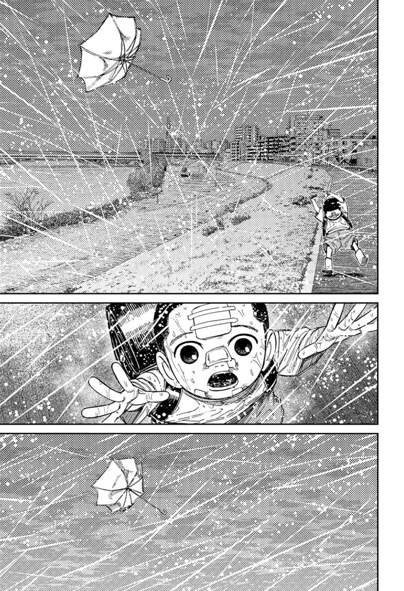 Unji's brother lets go of the umbrella, and it flies into the sky.