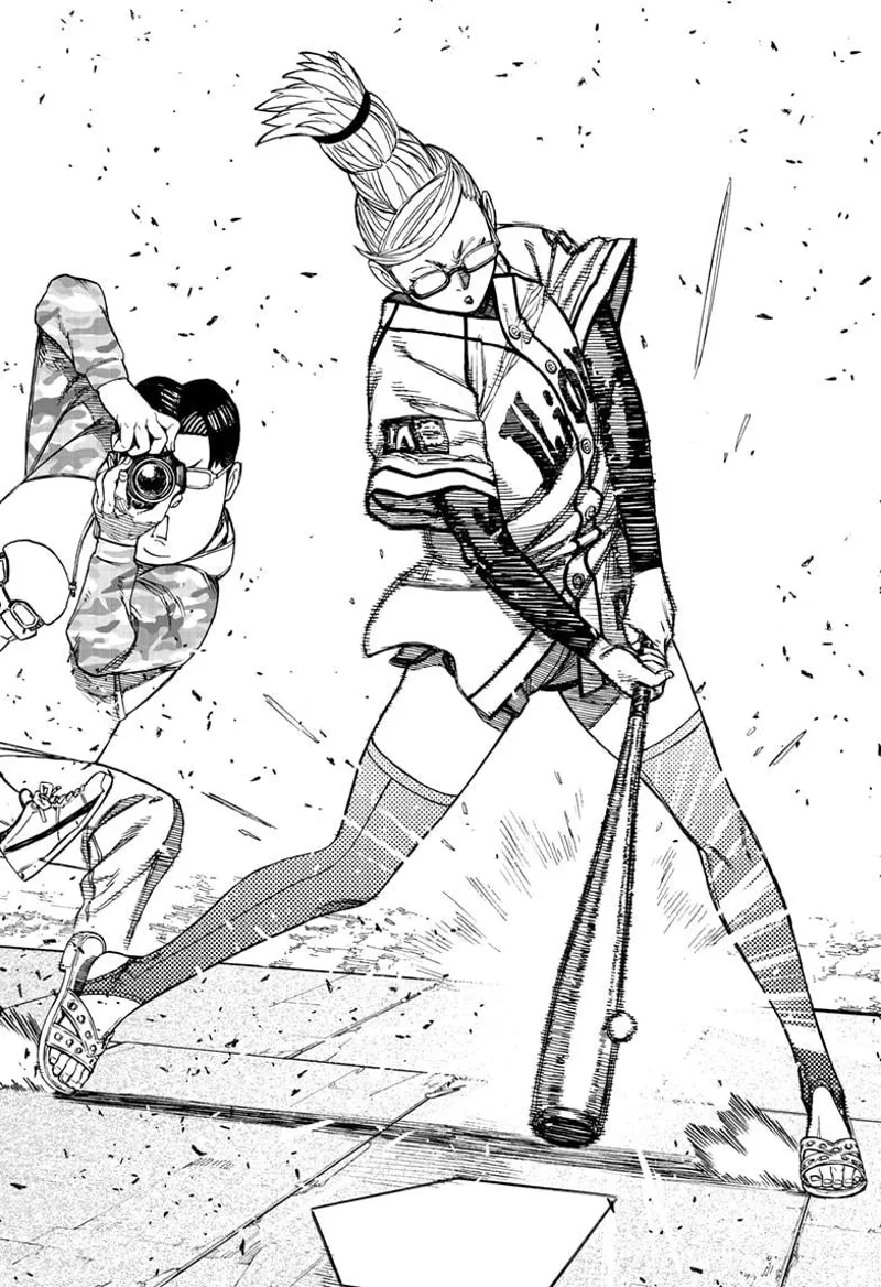 Grandma hits the nutball with her baseball bat. Kinta is behind her, taking pictures.