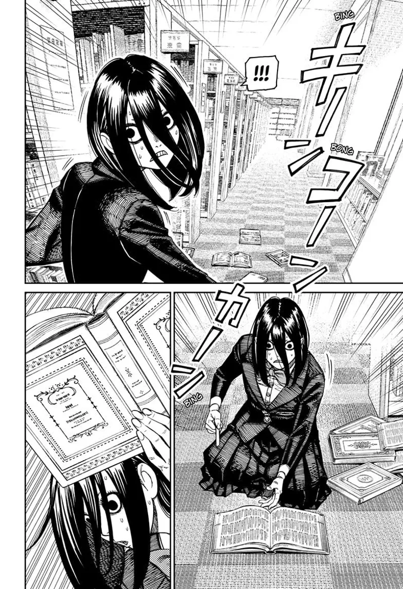 The student lady turns her head around and picks up the book afterward.