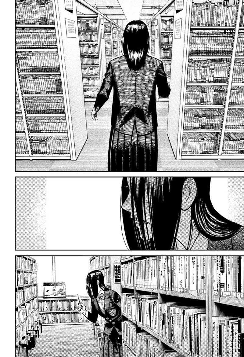 A lady student enters the empty library wearing a black school uniform.