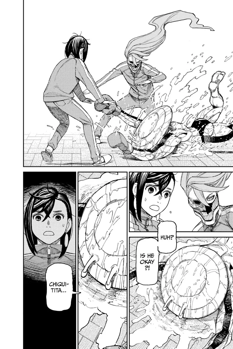 The monster boxer suddenly collapses forward in front of Momo and Aira.