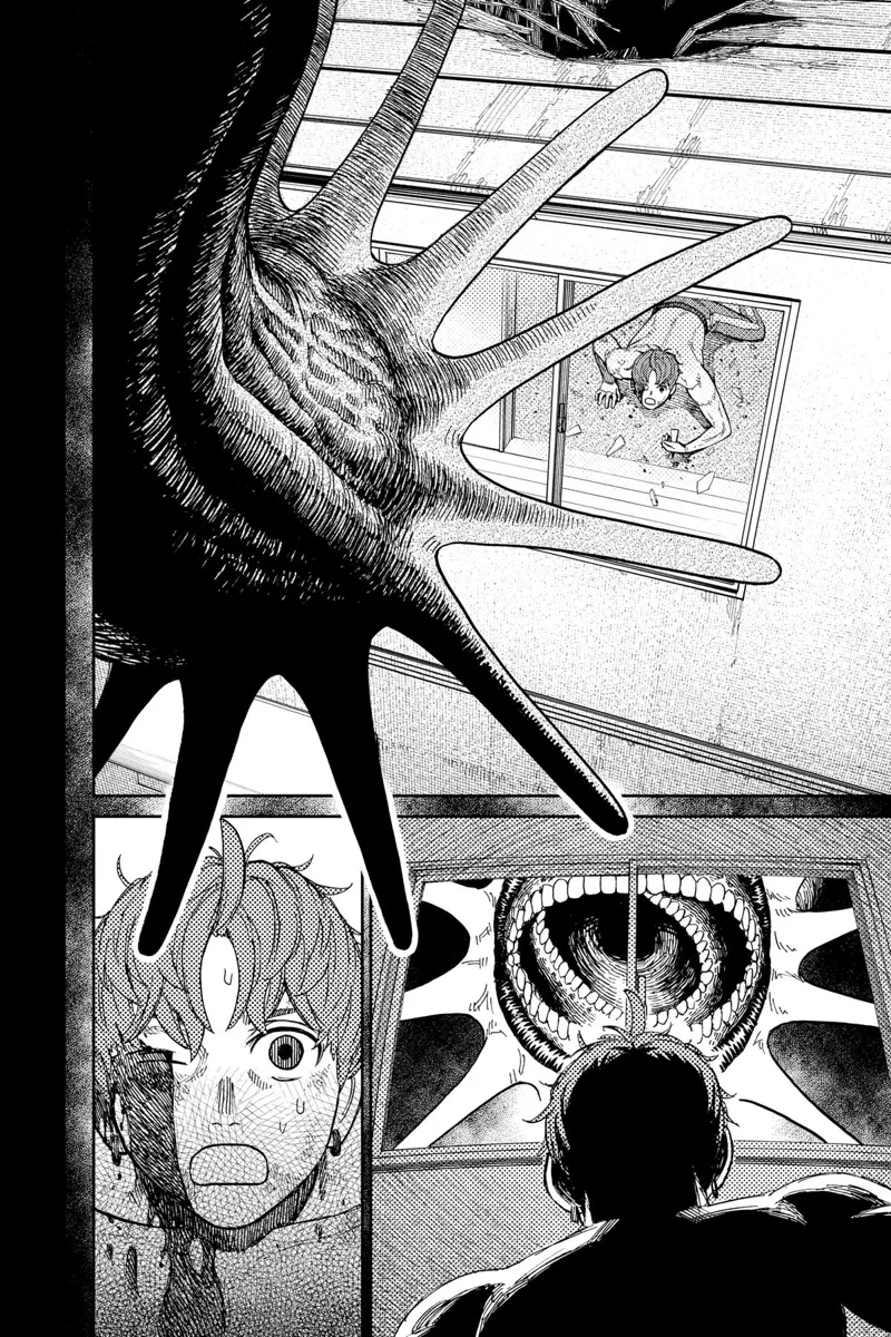 Jiji looks out the window and sees the huge Kuragari snake monster opening its mouth, about to attack and eat him.