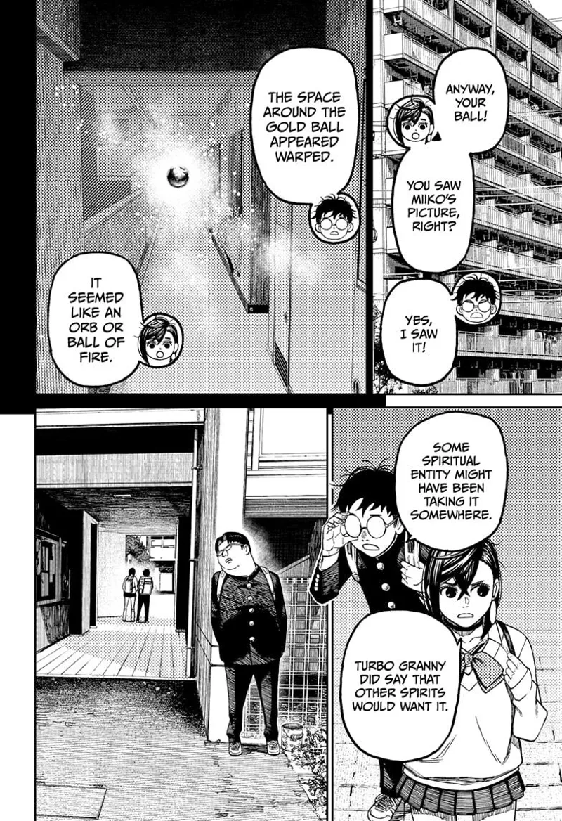 Momo and Okarun move deep into the empty apartment building. Okarun's chubby, nerdy classmate secretly follows them.