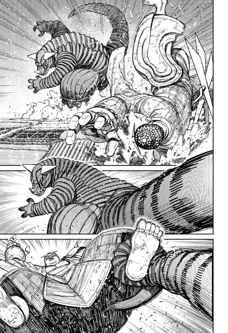 The Buddha crashes to the ground. The Kaiju grabs its leg with its tail.