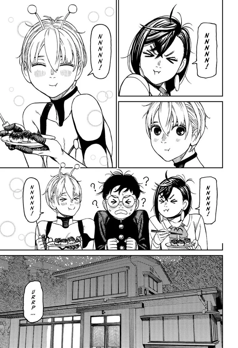 Momo and Vamola stare at Okarun while they eat Takoyaki.