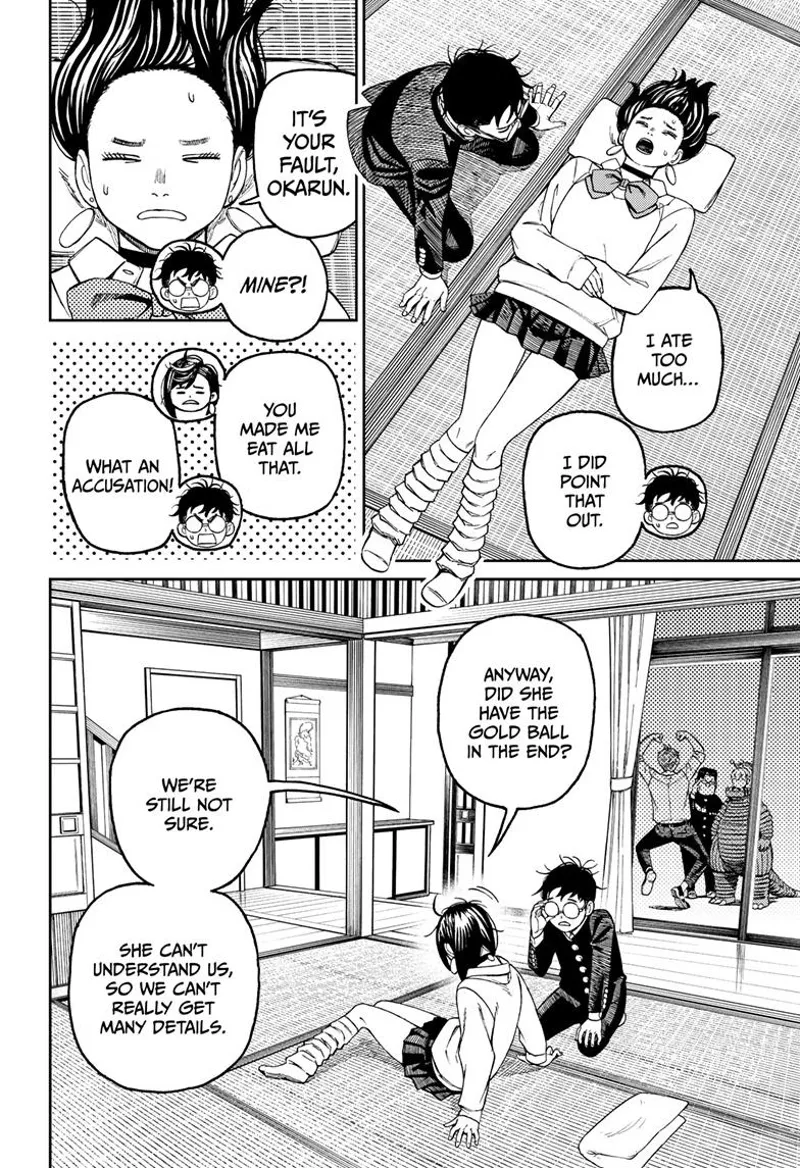 Momo is lying on the floor with an aching belly after overeating. She asks Okarun about the golden ball.