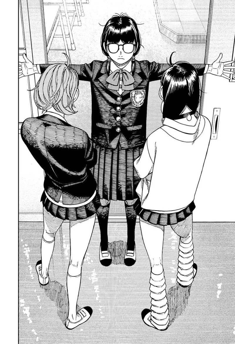 A woman student in glasses blocks the door to not let Momo and Aira enter.