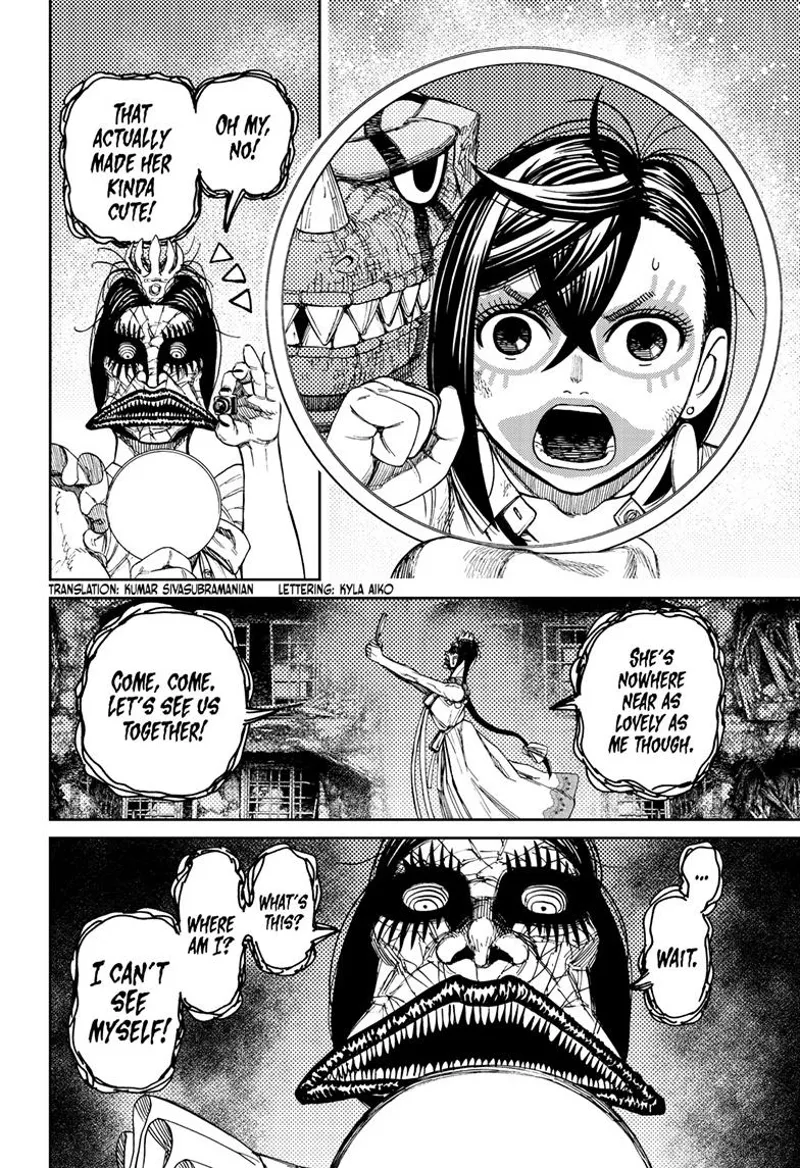 Momo's face has lipstick all over. The ugly ghost lady holds the mirror arm-length to see them.